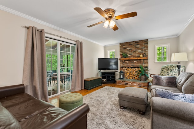 61 Winding Rdg, Southington, CT 06489 - living area with crown molding, wood finished floors, a ceiling fan, and a brick fireplace