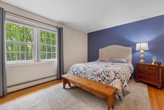 61 Winding Rdg, Southington, CT 06489 - bedroom with a baseboard radiator and wood finished floors
