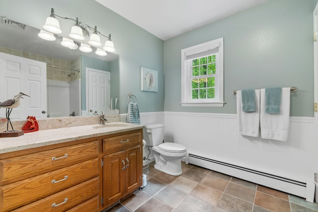 61 Winding Rdg, Southington, CT 06489 - bathroom featuring baseboard heating, vanity, wainscoting, toilet, and a shower