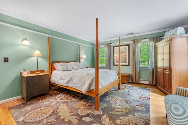 61 Winding Rdg, Southington, CT 06489 - bedroom with wood finished floors, crown molding, baseboards, and a baseboard radiator