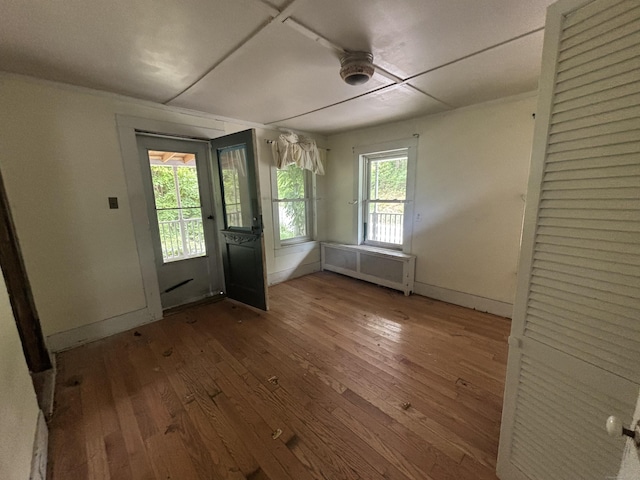 29 Middle Tpke, Mansfield, CT 06268 - entryway featuring radiator, hardwood / wood-style flooring, and baseboards