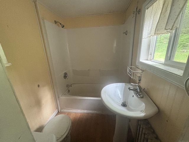 29 Middle Tpke, Mansfield, CT 06268 - full bath with wood finished floors, toilet, shower / bathtub combination, and a sink