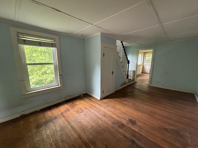 29 Middle Tpke, Mansfield, CT 06268 - spare room with stairway, wood finished floors, and baseboards