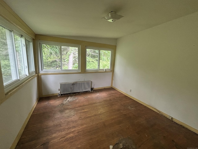 29 Middle Tpke, Mansfield, CT 06268 - spare room with radiator, baseboards, and wood finished floors