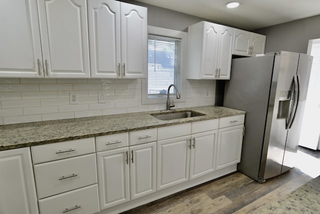 155 Cedar St, New Haven, CT 06519 - kitchen with a sink, stainless steel refrigerator with ice dispenser, dark wood-type flooring, white cabinetry, and light stone counters