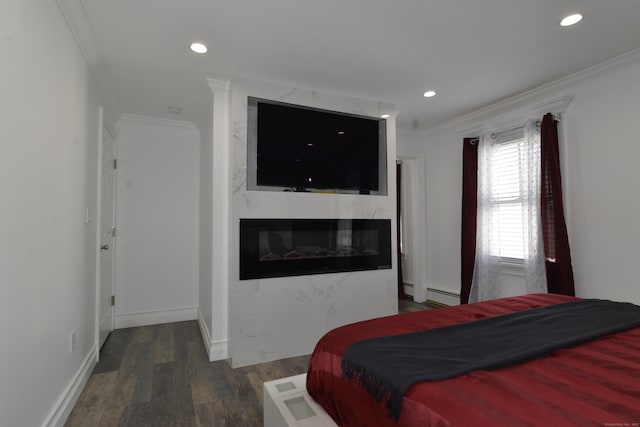 155 Cedar St, New Haven, CT 06519 - bedroom featuring wood finished floors, baseboard heating, ornamental molding, recessed lighting, and baseboards