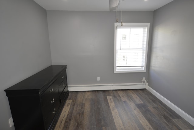 155 Cedar St, New Haven, CT 06519 - spare room featuring a baseboard radiator, dark wood-style floors, and baseboards