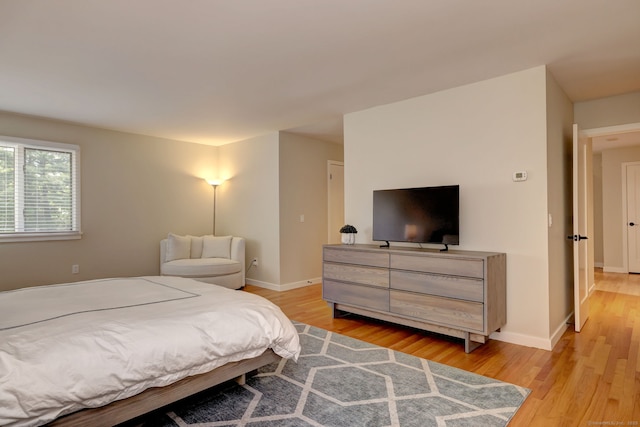 690 Forest Rd Unit 442, West Haven, CT 06516 - bedroom featuring light wood-type flooring and baseboards