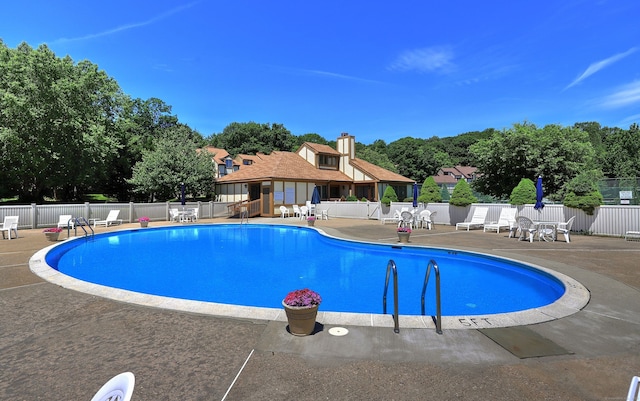 690 Forest Rd Unit 442, West Haven, CT 06516 - community pool featuring a patio