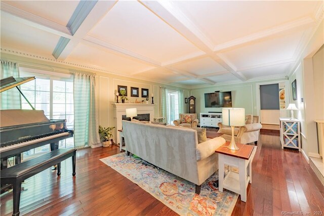 36 Old Johnson Ln, Middletown, CT 06457 - living area with coffered ceiling, healthy amount of natural light, dark wood-type flooring, beam ceiling, and a fireplace