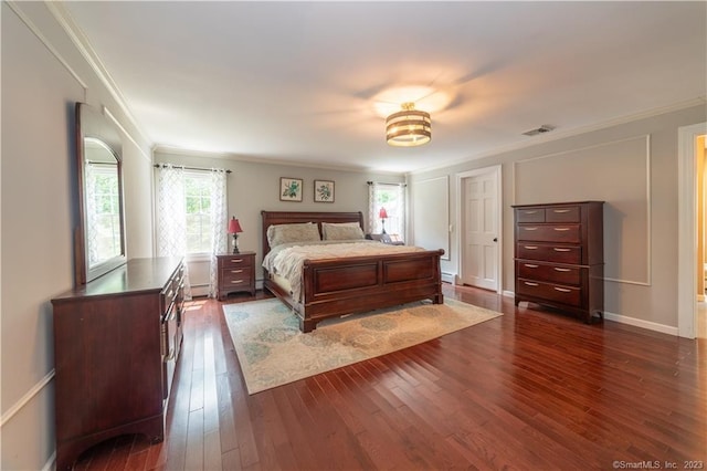 36 Old Johnson Ln, Middletown, CT 06457 - bedroom featuring ornamental molding, dark wood finished floors, baseboard heating, and baseboards