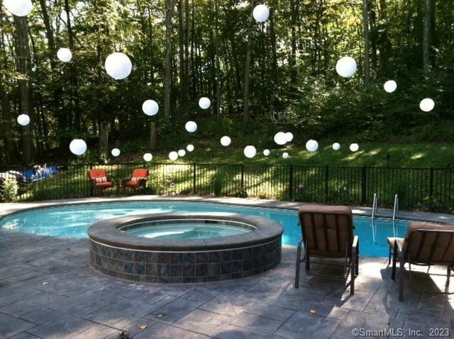 36 Old Johnson Ln, Middletown, CT 06457 - view of pool with a patio area and a pool with connected hot tub