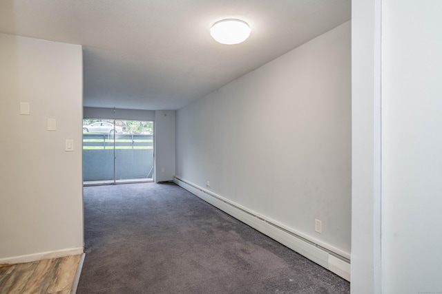 104 Oakwood Ave Apt T3, West Hartford, CT 06119 - carpeted spare room featuring a baseboard heating unit and baseboards