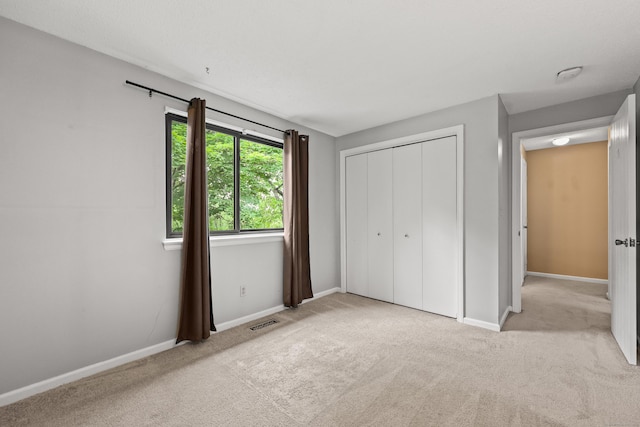 36 Wood Duck Ln Unit 36, Simsbury, CT 06081 - unfurnished bedroom with carpet, baseboards, and a closet