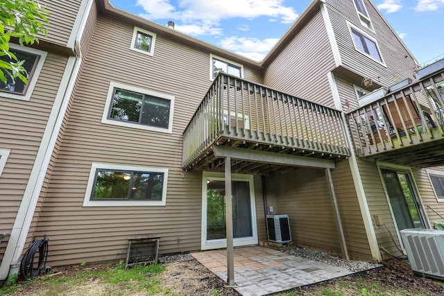 36 Wood Duck Ln Unit 36, Simsbury, CT 06081 - back of property with central AC, ac unit, a patio, and a deck
