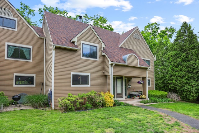 36 Wood Duck Ln Unit 36, Simsbury, CT 06081 - view of front facade featuring a front lawn and roof with shingles