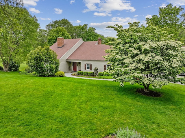 15 Silvermine Woods Rd Unit 15, Wilton, CT 06897 - view of front of home with a front lawn and a chimney