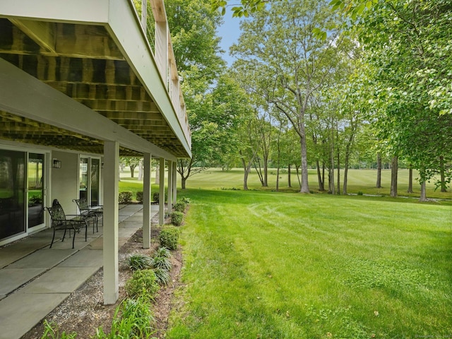 15 Silvermine Woods Rd Unit 15, Wilton, CT 06897 - view of grassy yard featuring a patio and view of wooded area