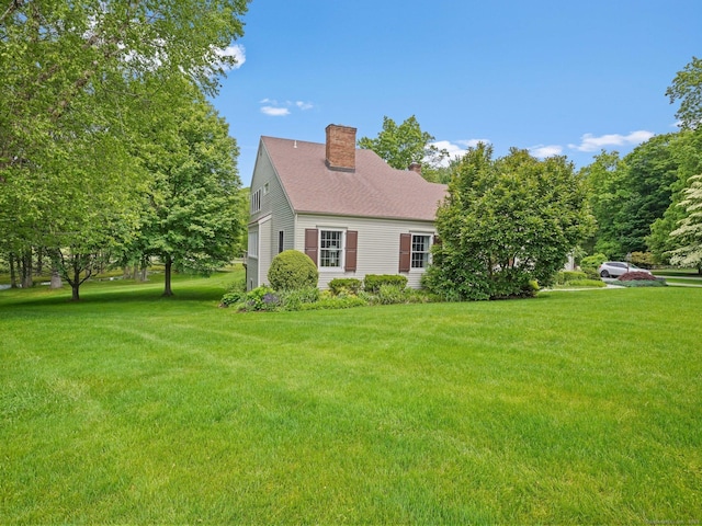 15 Silvermine Woods Rd Unit 15, Wilton, CT 06897 - view of property exterior with a chimney and a lawn