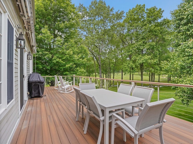 15 Silvermine Woods Rd Unit 15, Wilton, CT 06897 - wooden terrace with outdoor dining space, view of scattered trees, and grilling area