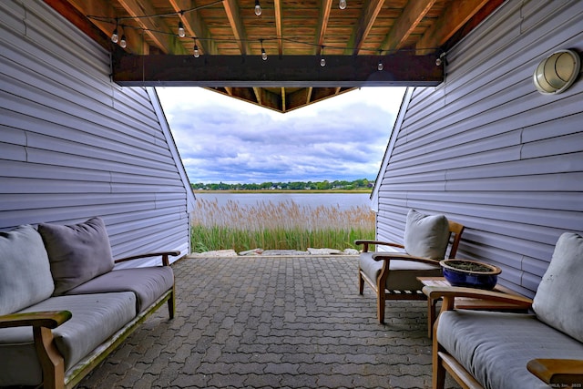 714 Popes Island Rd Unit 714, Milford, CT 06461 - view of patio with a water view
