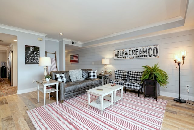 714 Popes Island Rd Unit 714, Milford, CT 06461 - living room featuring wood finished floors, ornamental molding, baseboards, recessed lighting, and wood walls