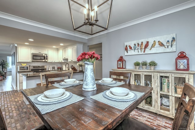 714 Popes Island Rd Unit 714, Milford, CT 06461 - dining room with recessed lighting, crown molding, and a chandelier