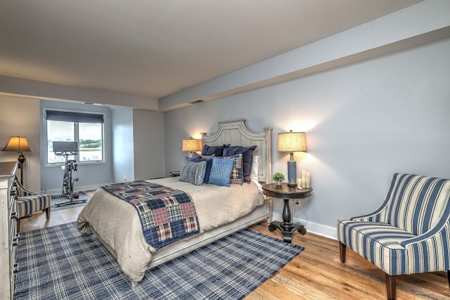 714 Popes Island Rd Unit 714, Milford, CT 06461 - bedroom with wood finished floors and baseboards