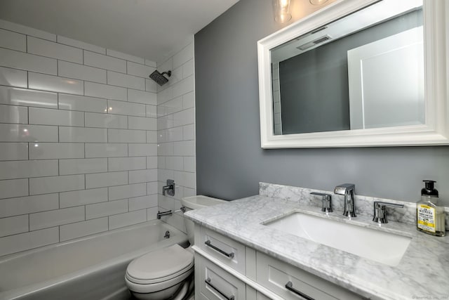 714 Popes Island Rd Unit 714, Milford, CT 06461 - bathroom featuring vanity, bathing tub / shower combination, and toilet