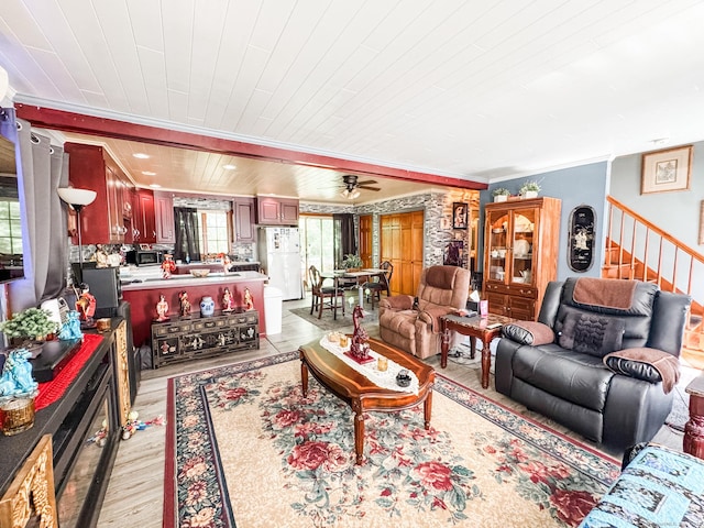 523 Wauregan Rd, Killingly, CT 06239 - living room with crown molding, wood ceiling, stairs, light wood-type flooring, and a ceiling fan
