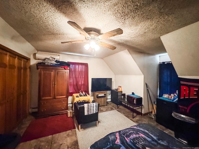 523 Wauregan Rd, Killingly, CT 06239 - bedroom with a textured ceiling, lofted ceiling, ceiling fan, and an AC wall unit