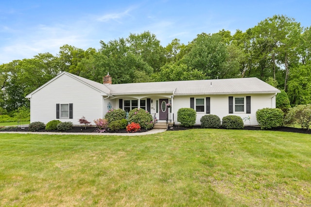 19 Ridgeview Dr, Ellington, CT 06029 - ranch-style home featuring a front lawn, a chimney, and covered porch