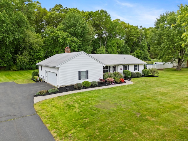 19 Ridgeview Dr, Ellington, CT 06029 - ranch-style house featuring a chimney, asphalt driveway, a front lawn, and an attached garage