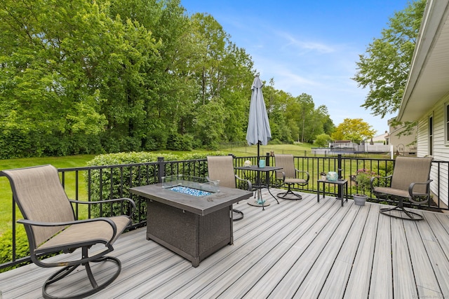 19 Ridgeview Dr, Ellington, CT 06029 - deck with a fire pit, a lawn, and view of scattered trees