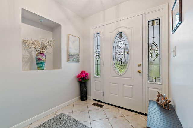 19 Ridgeview Dr, Ellington, CT 06029 - foyer entrance with light tile patterned floors and baseboards