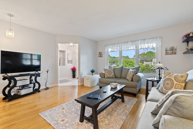 19 Ridgeview Dr, Ellington, CT 06029 - living room featuring wood finished floors and baseboards
