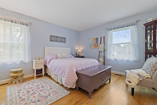 19 Ridgeview Dr, Ellington, CT 06029 - bedroom with light wood-style floors and baseboards