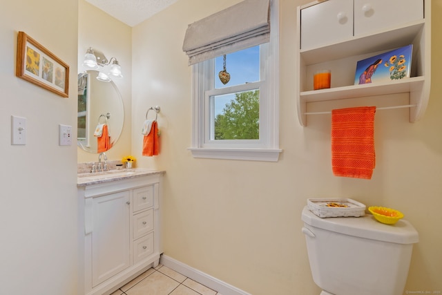 19 Ridgeview Dr, Ellington, CT 06029 - bathroom featuring vanity, toilet, tile patterned flooring, and baseboards
