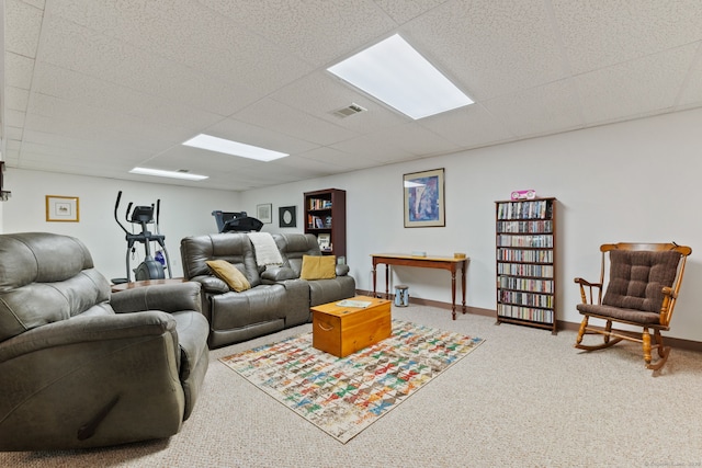 19 Ridgeview Dr, Ellington, CT 06029 - carpeted living area featuring a drop ceiling and baseboards