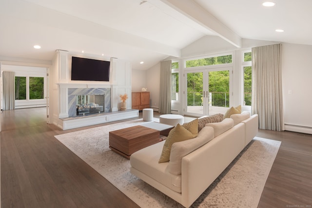 50 Parish Rd N, New Canaan, CT 06840 - living room featuring french doors, wood finished floors, a premium fireplace, a baseboard heating unit, and baseboard heating