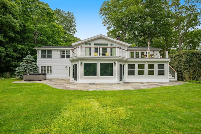 50 Parish Rd N, New Canaan, CT 06840 - rear view of property with a hot tub, a patio area, a balcony, and a yard