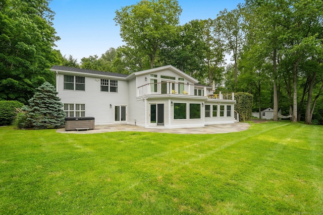50 Parish Rd N, New Canaan, CT 06840 - rear view of house with a hot tub, a patio area, a balcony, and a yard