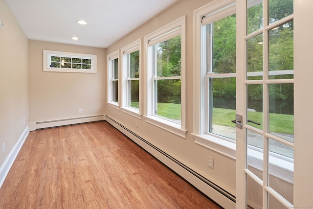 50 Parish Rd N, New Canaan, CT 06840 - unfurnished sunroom with plenty of natural light and a baseboard heating unit