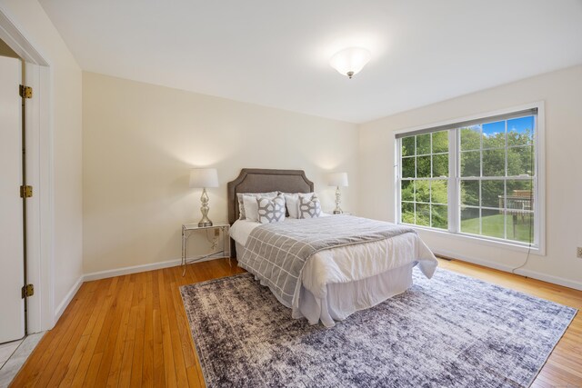 25 Hamden Hills Dr Unit 60, Hamden, CT 06518 - bedroom with light wood-style flooring and baseboards