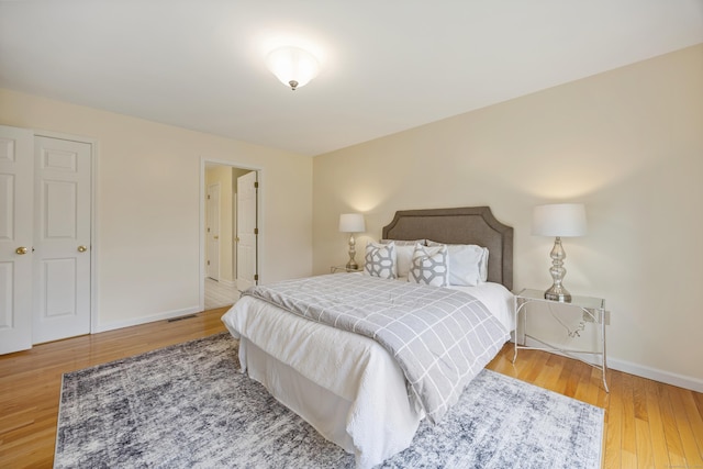 25 Hamden Hills Dr Unit 60, Hamden, CT 06518 - bedroom featuring wood finished floors and baseboards