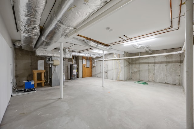 25 Hamden Hills Dr Unit 60, Hamden, CT 06518 - unfinished basement with water heater and heating unit