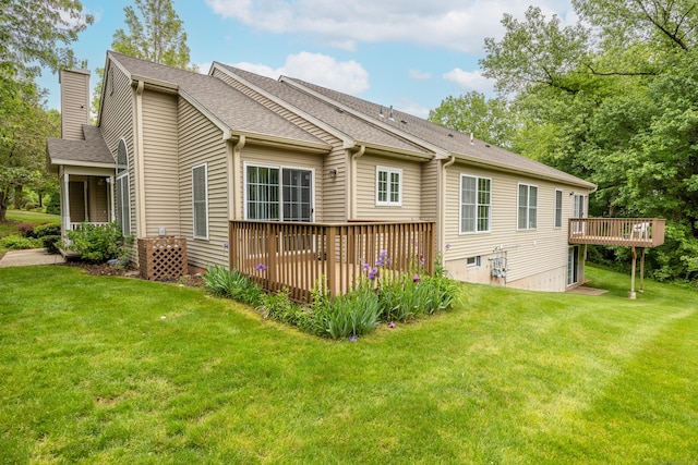 25 Hamden Hills Dr Unit 60, Hamden, CT 06518 - rear view of house featuring a deck, a chimney, a lawn, and a shingled roof