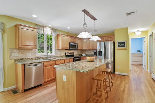 22 Gelding Hill Rd, Newtown, CT 06482 - kitchen featuring appliances with stainless steel finishes, a sink, light wood finished floors, decorative backsplash, and recessed lighting