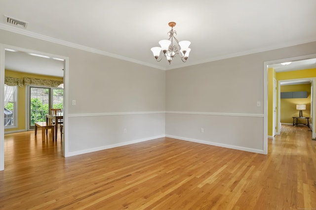 22 Gelding Hill Rd, Newtown, CT 06482 - spare room featuring a chandelier, light wood finished floors, baseboards, and ornamental molding