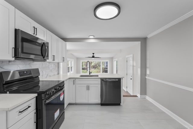 330 Meriden Ave, Southington, CT 06489 - kitchen with black range with electric cooktop, dishwasher, stainless steel microwave, a sink, and a peninsula